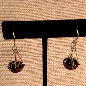 Bird in nest earrings.